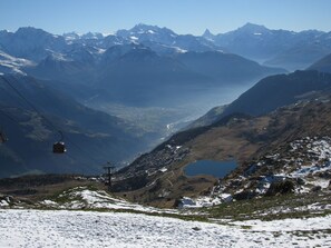 Explore breathtaking mountain vistas and serene valleys from a unique vantage point.