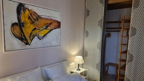 1 dormitorio, tabla de planchar con plancha, cuna de viaje y wifi