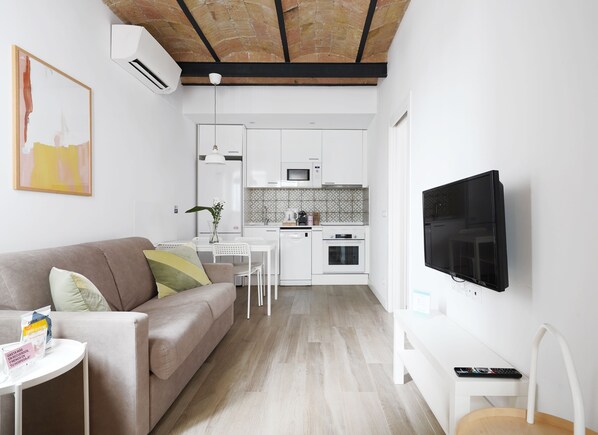 Televisión de pantalla plana de 30 pulgadas con canales vía satélite