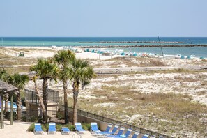 On the beach, sun-loungers