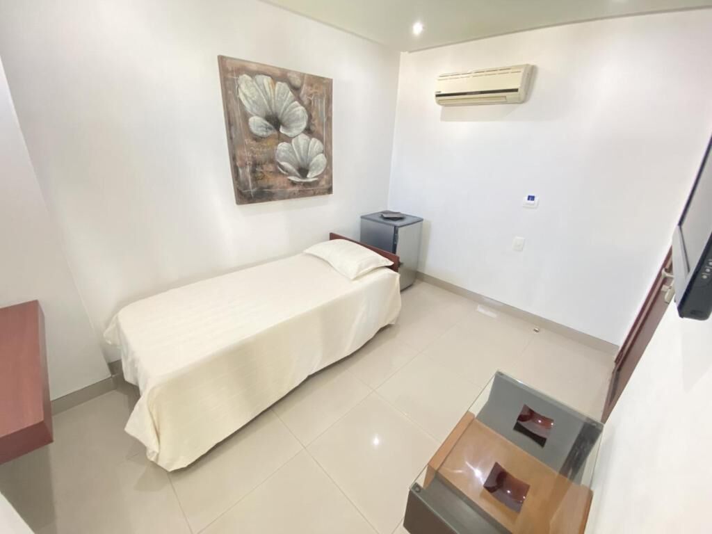 desk, laptop workspace, blackout curtains, iron/ironing board