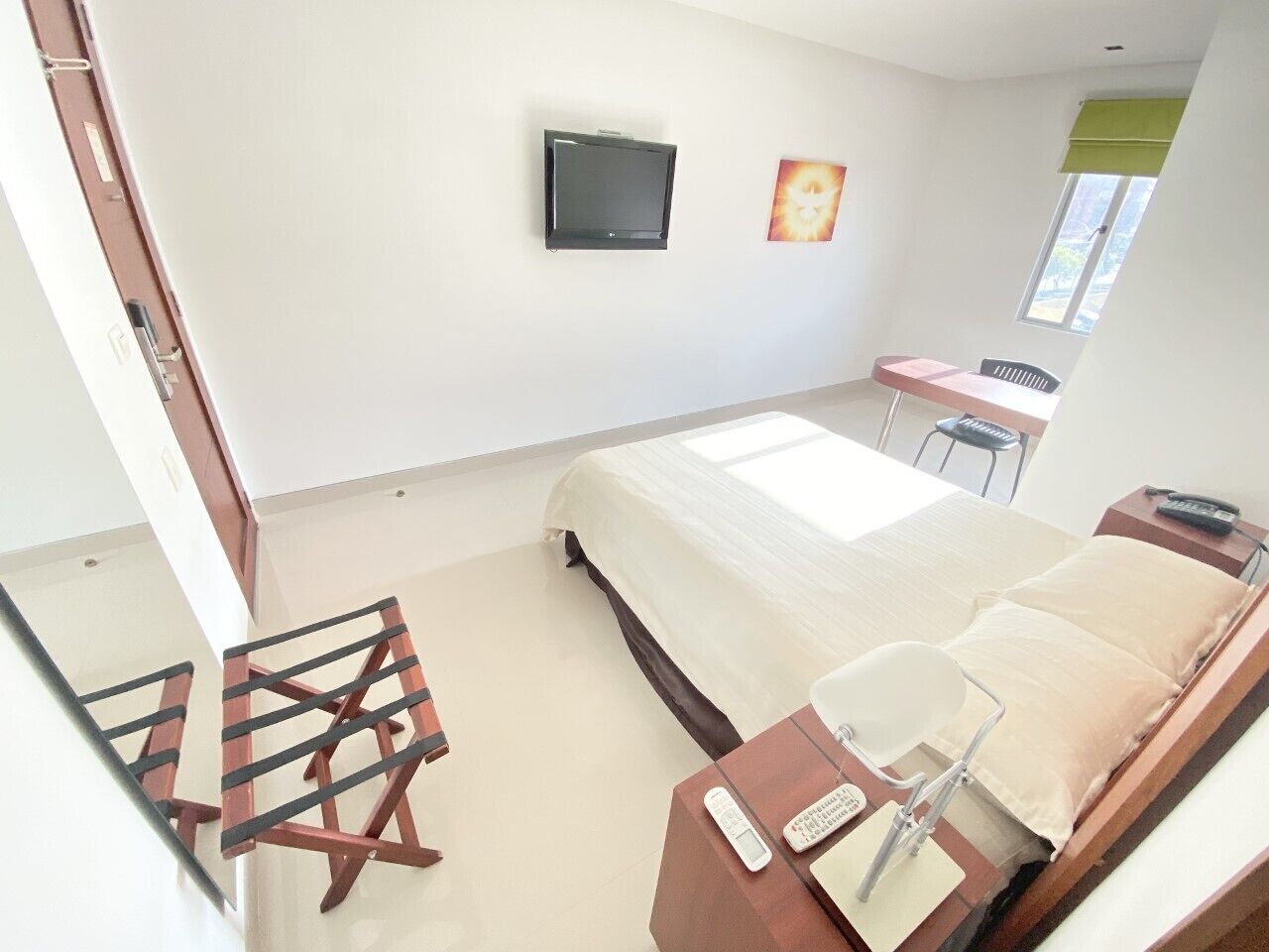 standard double room | desk, laptop workspace, blackout curtains, iron/ironing board