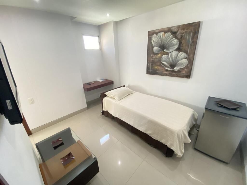 desk, laptop workspace, blackout curtains, iron/ironing board