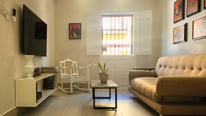 Apartment, 1 Bedroom | Living area | 40-inch plasma TV with digital channels, TV