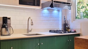 Apartment, 1 Bedroom | Private kitchen | Coffee/tea maker, full-size fridge, oven, cookware/dishes/utensils