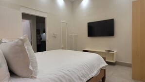 Apartment, 1 Bedroom | Iron/ironing board, WiFi (free), bed sheets