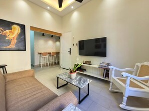 Apartment, 1 Bedroom | Living area | 40-inch plasma TV with digital channels, TV