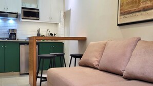 Apartment, 1 Bedroom | Living area | 40-inch plasma TV with digital channels, TV
