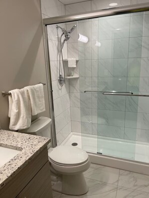 Shower, hair dryer, towels, soap - Downtown Historic Warehouse District Lofts 205 (Cleveland)
