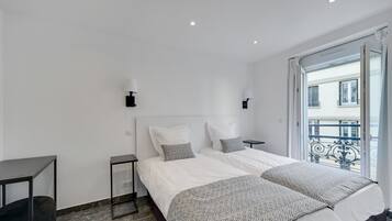 Appartement, meerdere bedden | 1 slaapkamer, verduisterende gordijnen, geluiddichte muren