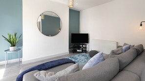 42-inch flat-screen TV with digital channels, TV