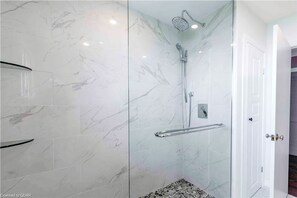 Shower, hair dryer, towels, toilet paper