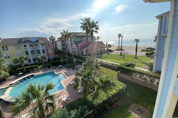 Our view of the beach & pool from the balcony