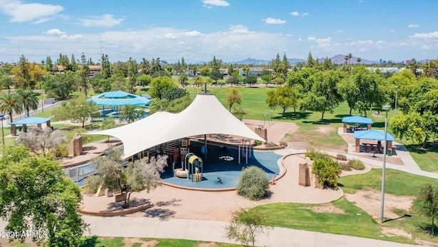 A large, open pavilion with a curved roof, surrounded by a well-maintained park with trees and picnic areas. - The Auburn at Tempe | Heated Pool + Park Adjacent (Tempe)