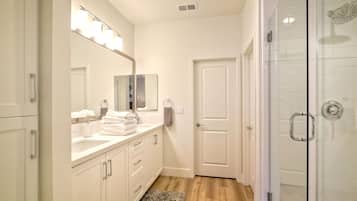 Bathtub, hair dryer, towels, soap