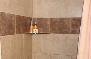 Combined shower/bathtub, towels, soap