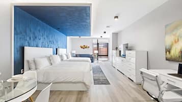 Tabla de planchar con plancha, wifi gratis y ropa de cama