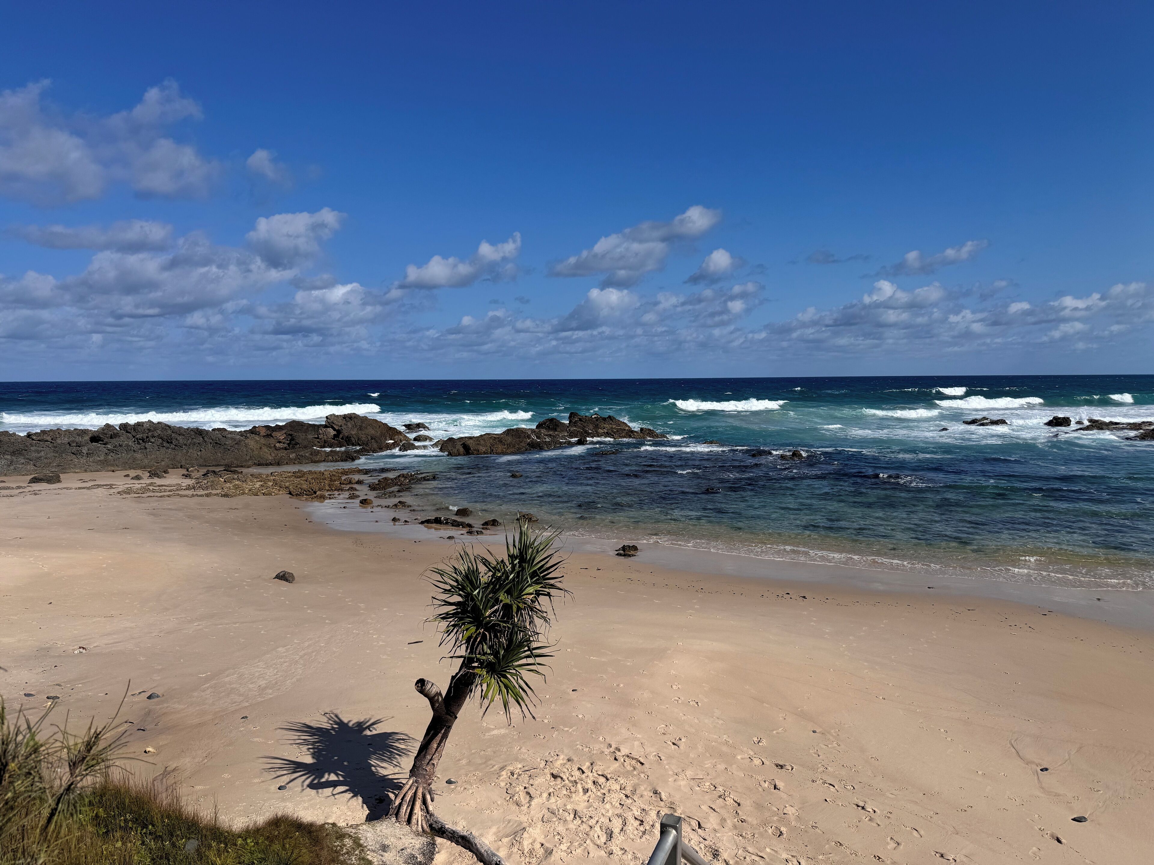 On the beach, sun-loungers