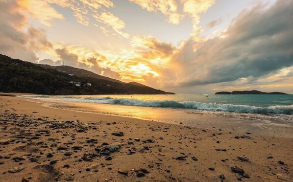 A beach with pebbles, waves, and a sunset. - A Peace in Paradise! (St Thomas)