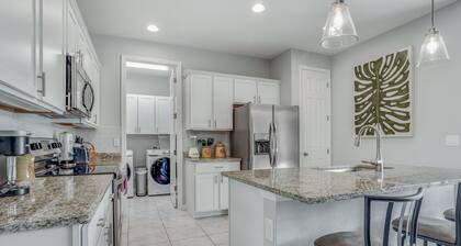 Contemporary Getaway with an Enclosed Yard, Fast WiFi, & Furnished Lanai