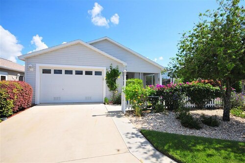 Experience the fun and excitement of The Villages in this beautiful Patio Villa.