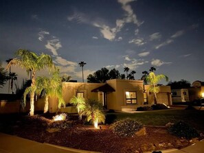A residential area at night with houses, palm trees, and a clear sky. - Kierland oasis, pool heater, spa, putting green (Scottsdale)