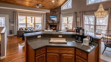 TV, fireplace, table football, books