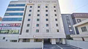A multi-story building with the sign "Bona Three Hotel" at the top. - Bonathree Hotel (Busan)