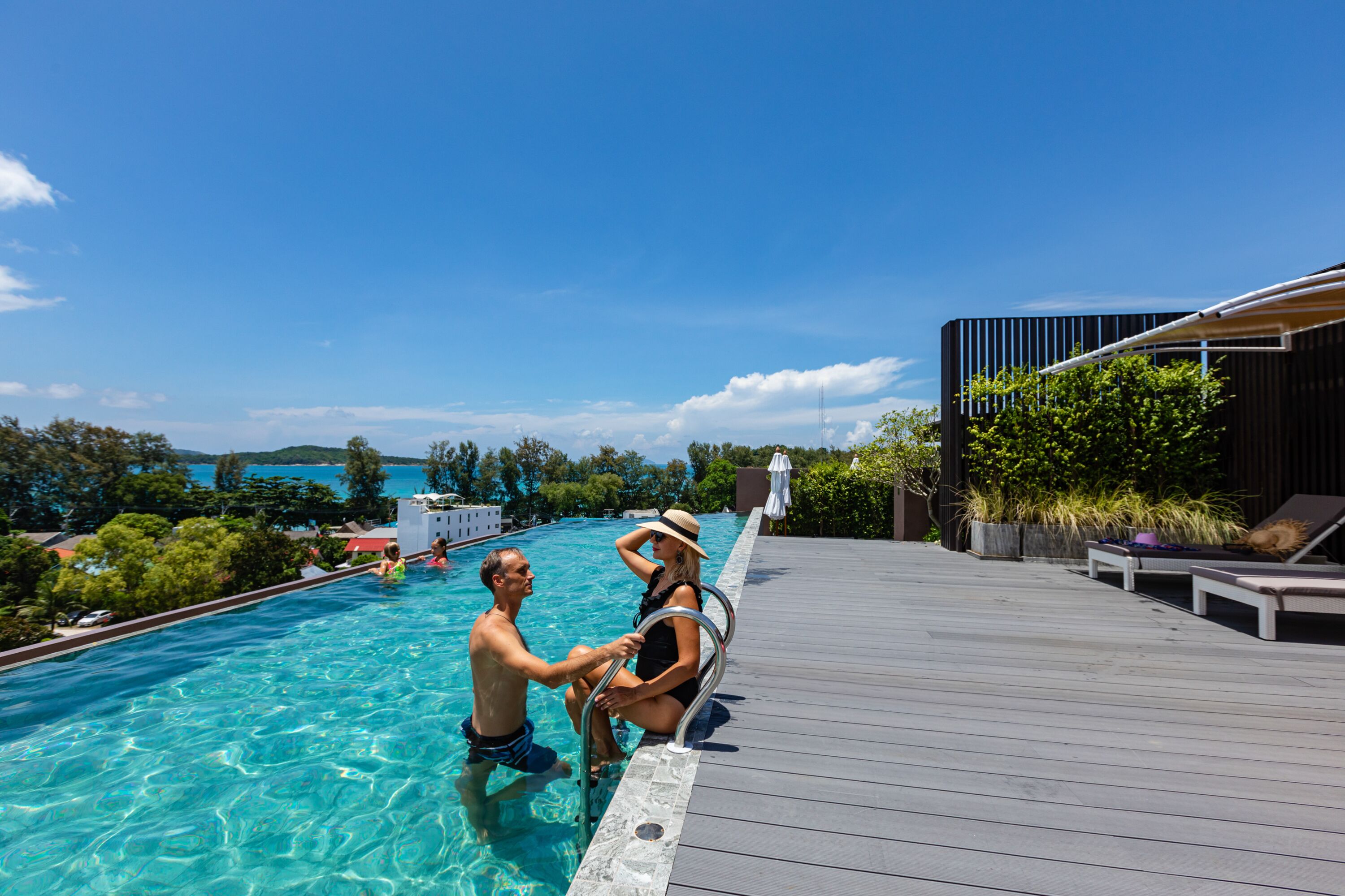 Outdoor pool, open 7:00 AM to 7:00 PM, pool umbrellas, pool loungers