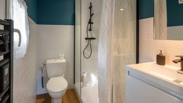 Shower, hair dryer, towels, soap