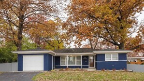 A single-story house with a garage, a front porch, and a driveway. - *The Comfy King Ranch*King Bed Suite*Fast Wi-Fi (Worth)