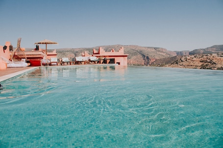 2 outdoor pools, open 8:00 AM to 9:00 PM, free cabanas, pool umbrellas