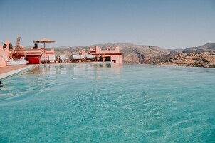 2 outdoor pools, open 8:00 AM to 9:00 PM, free cabanas, pool umbrellas