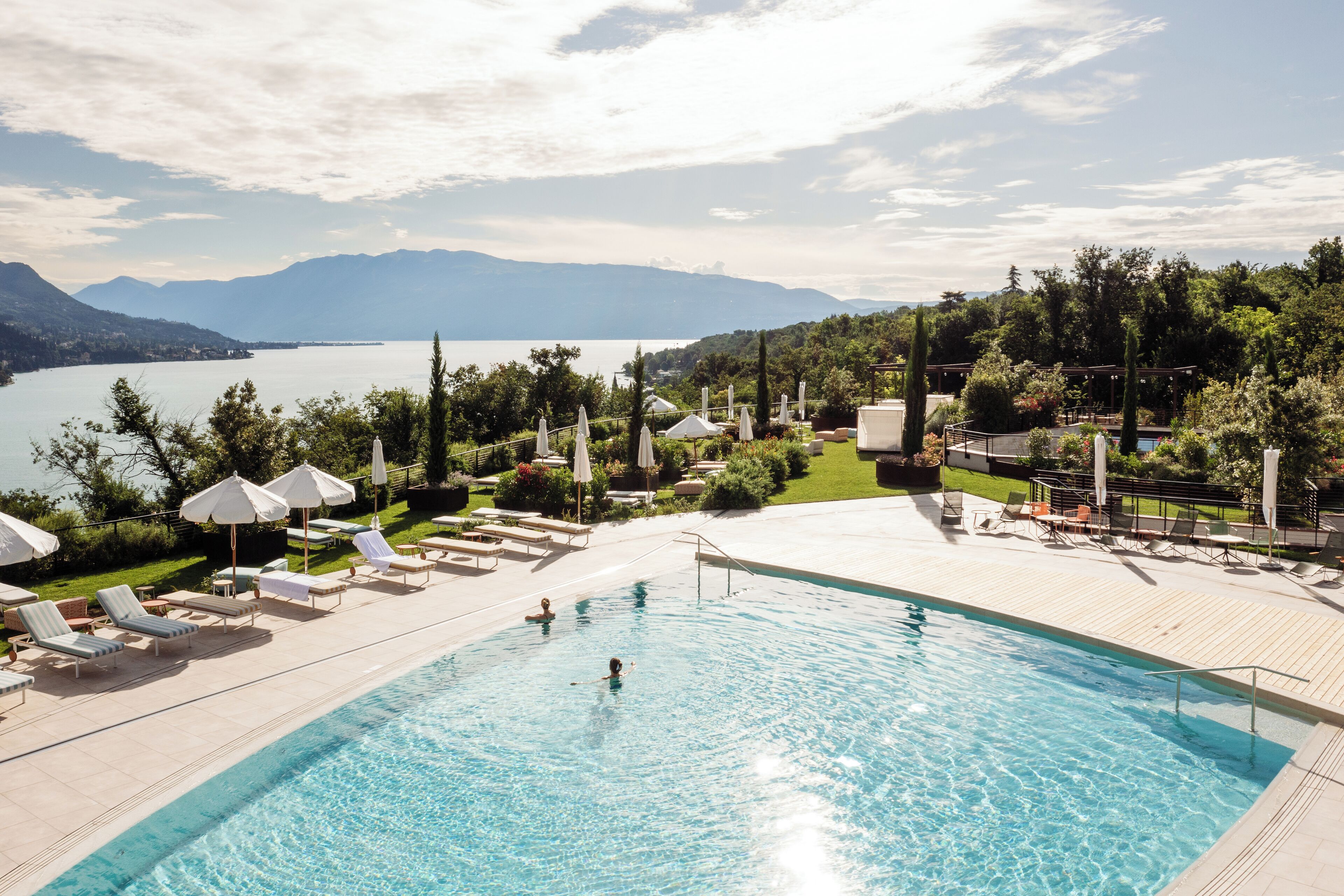 2 outdoor pools, open 8:00 AM to 6:00 PM, pool umbrellas, pool loungers