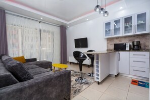 Living area - Park Heights Apartment by Edmor Suites (Syokimau)