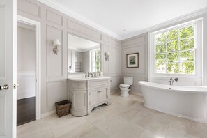 Bathtub, hair dryer, towels