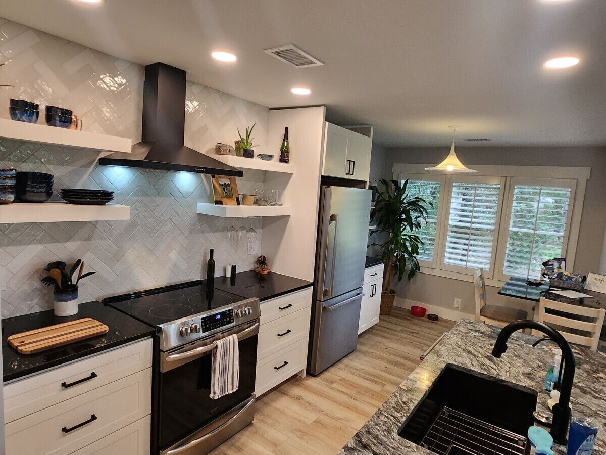 Fridge, microwave, coffee/tea maker, cookware/dishes/utensils
