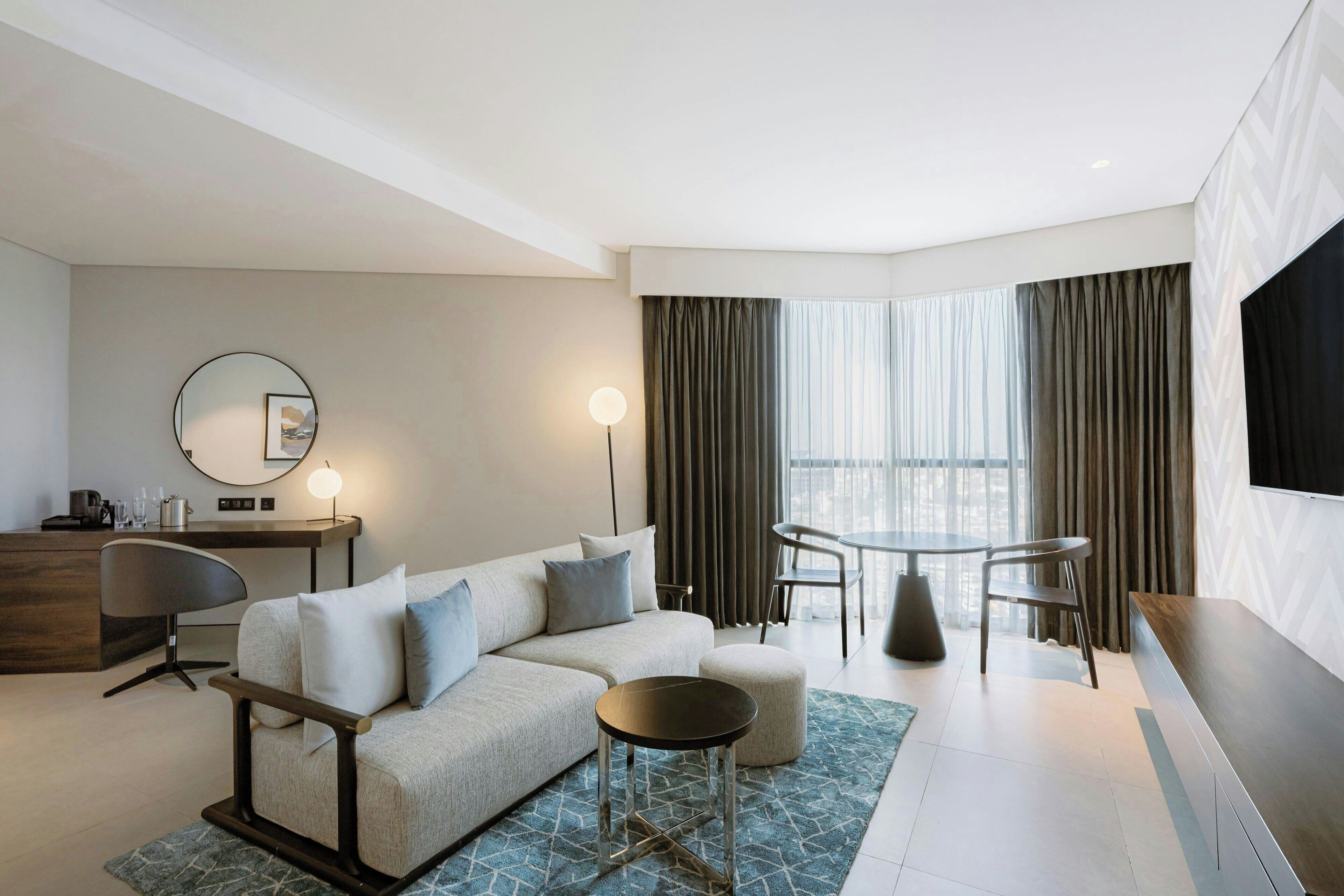 executive suite, 1 king bed, non smoking, city view | living room | 55-inch lcd tv with digital channels, tv