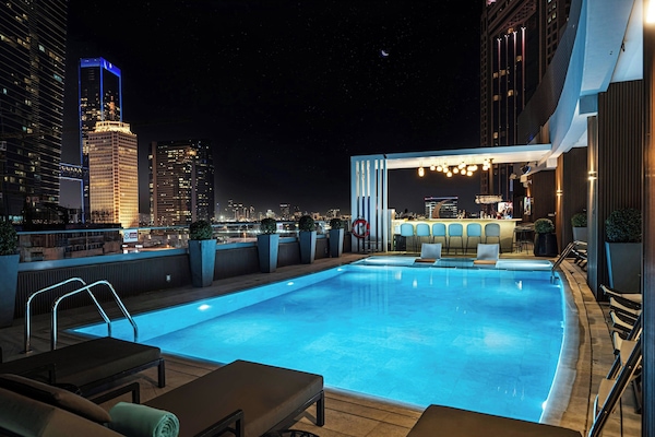 Outdoor pool, pool umbrellas, pool loungers