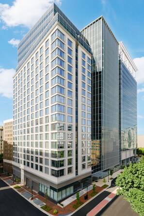 Stunning high-rise building with a grid-like pattern of windows.