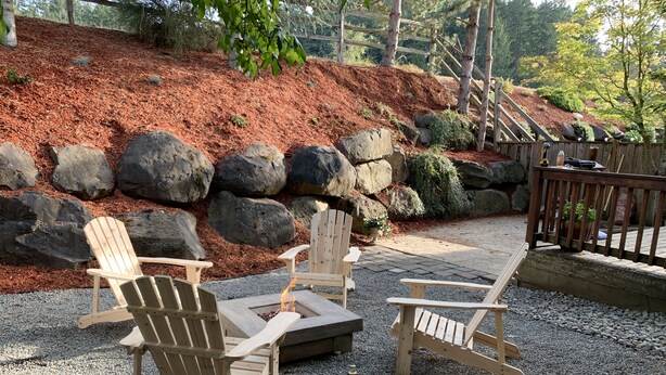 A patio area with Adirondack chairs and a fire pit. - Miller Hill Sanctuary near Intel w/ BBQ & Firepit (Aloha)