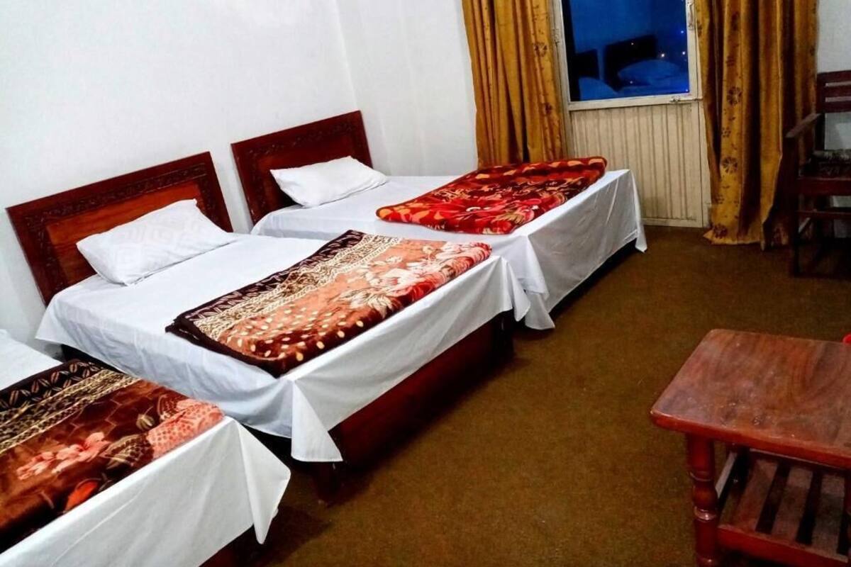 Standard Triple Room | Iron/ironing board, free WiFi