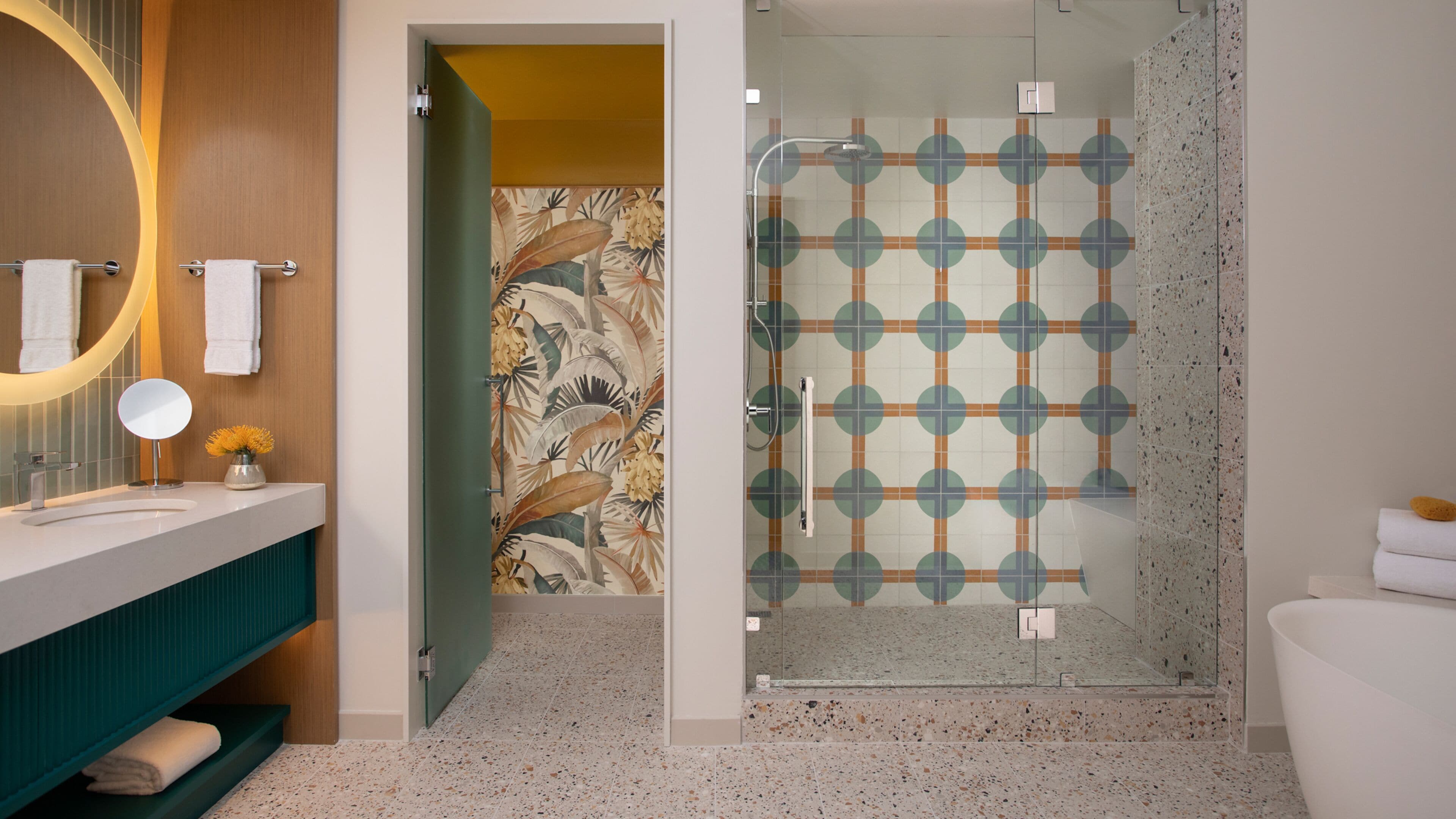 designer toiletries, hair dryer, bathrobes, slippers