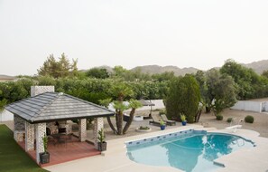 A heated pool - Luxury Mummy Mountain Paradise with Heated Pool, Fire Pit, and Sport Court (Paradise Valley)