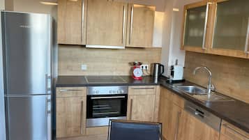 Deluxe-Apartment Bellevue | Eigene Küche | Großer Kühlschrank, Mikrowelle, Ofen, Herdplatte