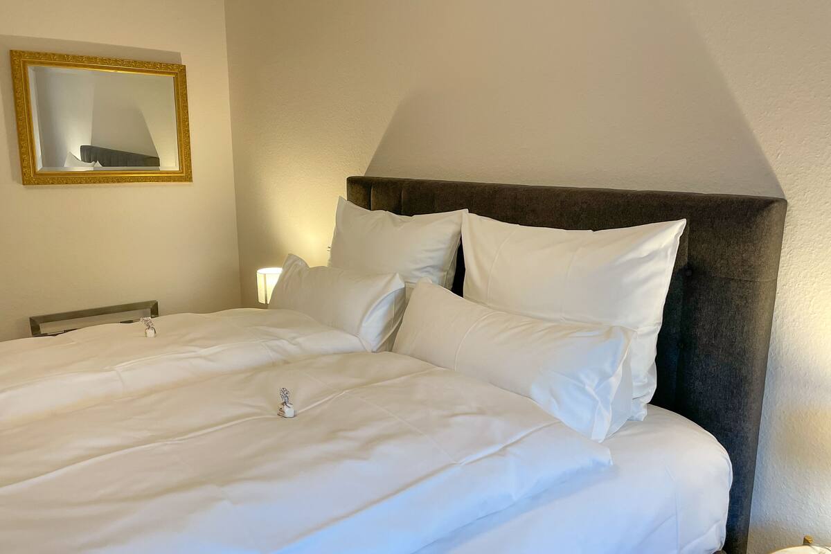 Deluxe-Apartment Bellevue | 1 habitación, sábanas de algodón egipcio y ropa de cama de alta calidad