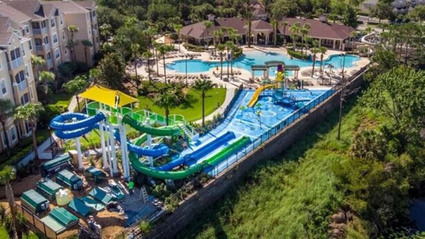 A resort with multiple swimming pools, water slides, and a large water park area. - Windsor Hills Resort/3Bed/POOL/Near Disney (Kissimmee)