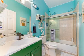 Combined shower/bathtub, hair dryer, towels, soap