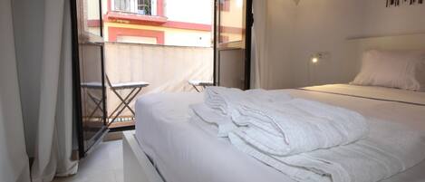 1 غرفة نوم ومكواة/لوح كي وخدمة الإنترنت وملاءات أسرّة