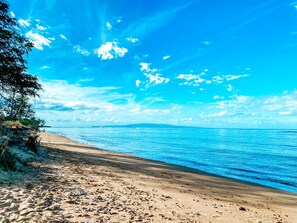 On the beach, sun-loungers, beach towels